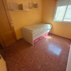 Habitación más pequeña con cama